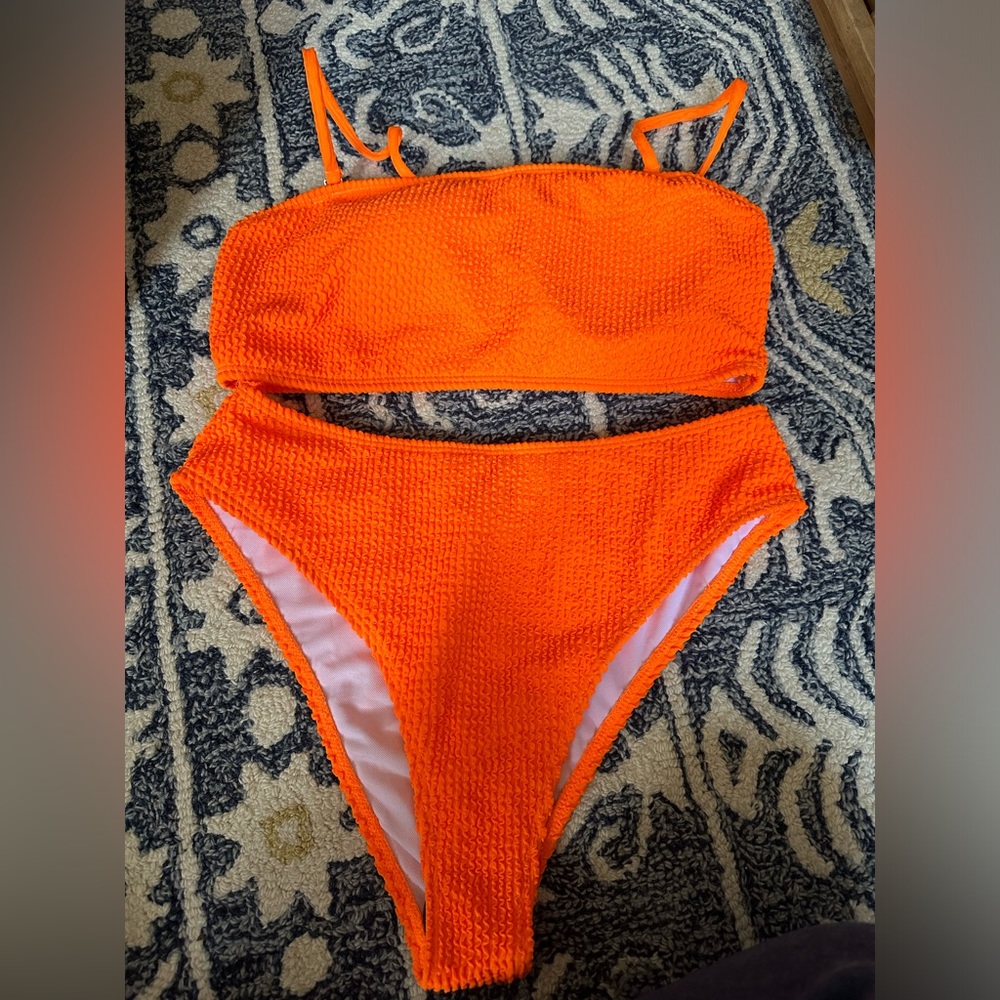 NEW bright orange bathing suit
